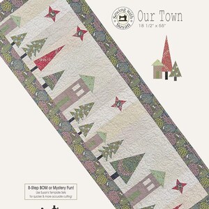 May include: A quilted table runner with a town scene design. The runner features houses, trees, and stars in shades of red, green, and beige. The dimensions are 18 1/2" x 55". The text "Our Town" is displayed on the runner.