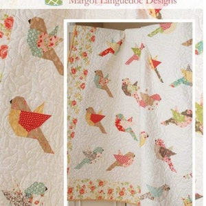 May include: A quilting pattern for a quilt featuring a design of colorful birds with the title "Feathers" and the website address "www.thepatternbasket.com".