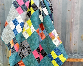Norma's Patchwork Quilt Pattern by Kaitlyn Howell - Modern layer cake friendly quilt pattern