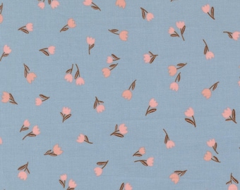 May include: A light blue fabric with a repeating pattern of small pink tulip flowers and brown stems. The floral design is scattered across the surface, creating a delicate and feminine aesthetic. Ideal for quilting, sewing, or crafting projects.