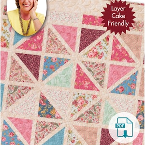 Puede incluir: Un patrón de acolchado para una colcha llamada "Cool Summer Porch" de Eleanor Burns. La colcha está hecha de tela rosa, azul y verde con un patrón floral. La colcha es un patrón compatible con la torta de capas. La colcha es una descarga PDF.