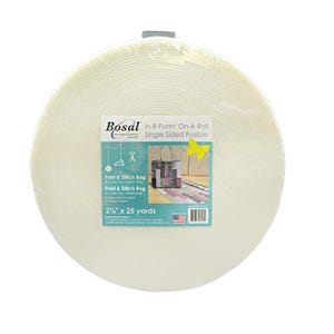 May include: A large, circular roll of white Bosal In-R-Form single-sided fusible foam stabilizer wrapped in clear plastic. The label displays the text 'In-R-Form On A Roll', 'Fold & Stitch Bag', 'Fold & Stitch Rug', and '2 1/4 inches x 25 yards'.