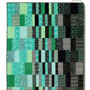 May include: A quilt pattern called "Morning Noon & Night" by Atkinson Designs. The pattern is for a fat quarter quilt and uses a variety of green, black, and gray fabrics.