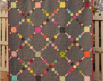 Irish Puzzle from Meadow Mist Designs is a Twist on the Classic Irish Chain Quilt, Charm Pack & Scraps
