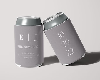 May include: Two gray can coolers with white text. One cooler says "E|J The Seylers Birmingham Alabama 20 22". The other cooler says "10 29 22".