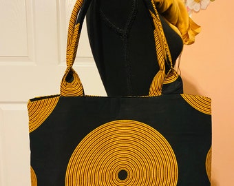 Asha-Kollektion von Ankara-Handtaschen: Schwarz-goldene Tragetasche