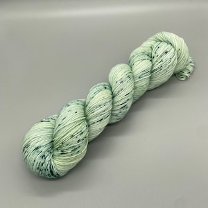 Hand Dyed Yarn, Superwash 75% Merino Wool, 25 Nylon Fingering Weight, Pastel Green, Green, Blue Speckles - 463yds per skein - Peace