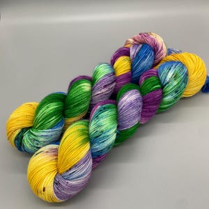 Hand Dyed Yarn, Superwash 75% Merino Wool, 25 Nylon Fingering, Purple, Blue, Yellow  Speckles - 463yds per skein - Botanical Gardens