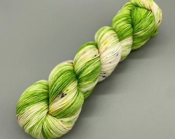 Hand Dyed Yarn, Superwash 75% Merino Wool, 25 Nylon Fingering Weight, Green, White, Speckles - 463yds per skein