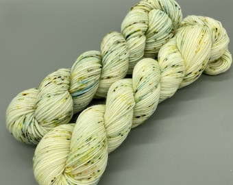 Hand Dyed Yarn, Superwash Merino wool, Bare wool, Cream, Green, Blue Speckles, Fingering Weight, Sport, DK, Worsted Weight - Mossy Stone