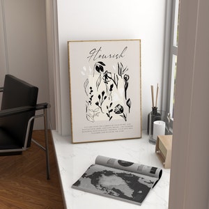 May include: A black and white floral print with the word "Nourish" in a gold frame. The text below the print reads "Let God tend the garden of your heart and water faith, hope, and love apart. Like flowers blooming with sunlight and rain, your soul will flourish and never be the same."