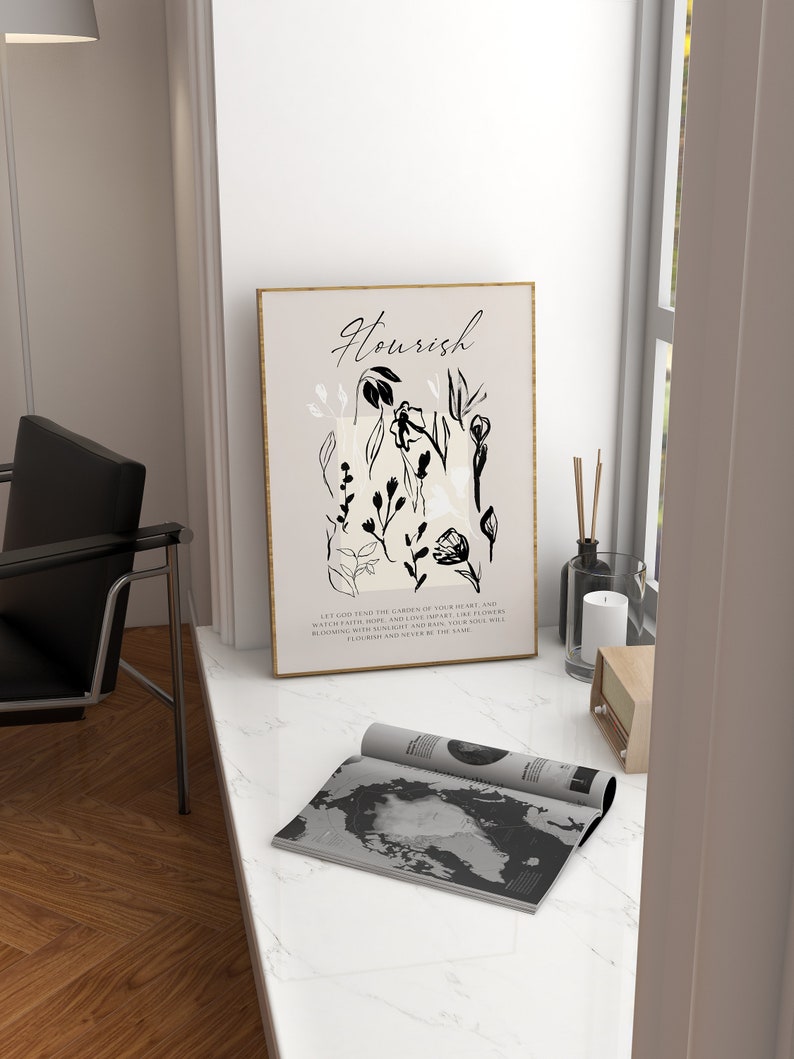 May include: A black and white floral print with the word "Nourish" in a gold frame. The text below the print reads "Let God tend the garden of your heart and water faith, hope, and love apart. Like flowers blooming with sunlight and rain, your soul will flourish and never be the same."