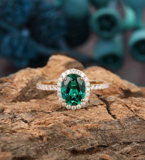 14k White or Yellow Gold Lab-Created Emerald Oval and Diamond Ring 14k White or Yellow Gold Lab-Created Emerald Oval and Diamond Ring