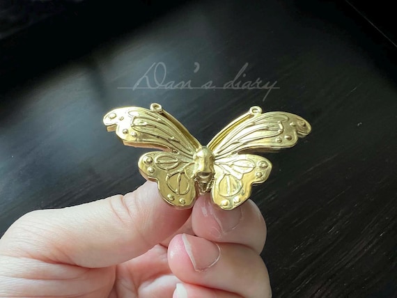 gold butterfly dresser knobs HUGOLEM 8 Pack Butterfly Shape Drawer Pulls - Stylish Kitchen Cabinet & Kid's Room Dresser Drawer Knobs - Modern Gold Dresser Knobs & Door/Window Pull Handles