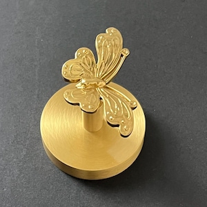 Gancio da parete a farfalla in ottone: appendiabiti/asciugamani nordico