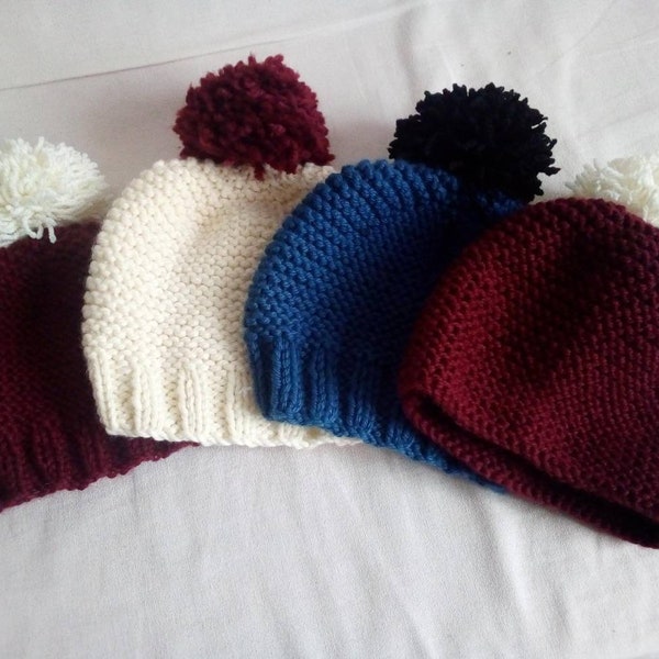 Adult hand-knitted wool hat with a large pom pom, winter accessory, ecru colors, blue, burgundy, gift