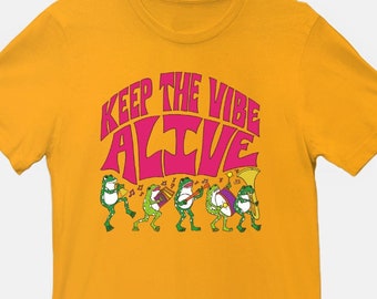 Keep The Vibe Alive Frog Parade T-Shirt.Fun Frog Graphic Shirt.Whimsical Frog Graphic Tee.Playful Frog Parade Shirt.Groovy Frog Musician Tee