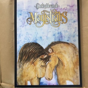 Dos carteles A3 del libro La manada de los magistrales