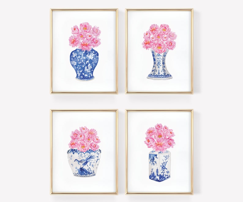 May include: Set of four watercolor prints featuring pink peonies in blue and white porcelain vases. The vases have a traditional Chinese design.