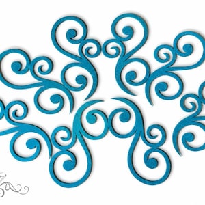 May include: A set of four teal blue decorative scrollwork cutouts featuring intricate swirling patterns and curved lines. Each piece displays a symmetrical design with rounded ends, arranged in a cluster to showcase the detailed filigree shapes.