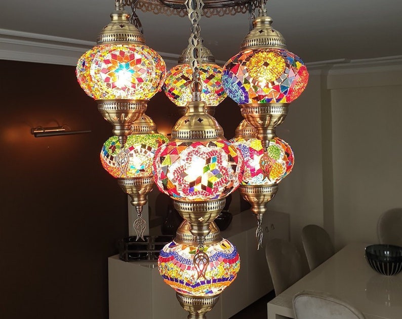 Adjustable Eight Armed Brass Ball Chandelier Casa Lumi