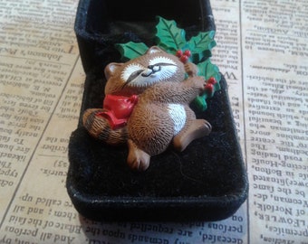Hallmark 1986 Raccoon with Holly and Red Bow, Signed and Dated