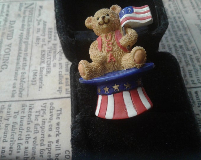 Avon Cast Resin Patriotic Teddy Bear Pin, Dated '99, with US Flag, Sitting in Star Spangled Top Hat, Marked USA on Tummy