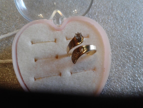 April Adjustable Simulated Birthstone Ring, Curre… - image 1