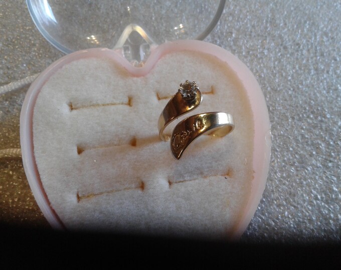 April Adjustable Simulated Birthstone Ring, Currently About a Size 6