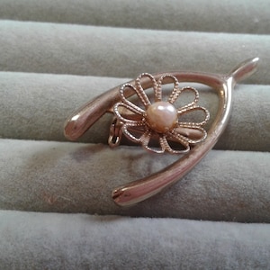 Small Goldtone Wishbone Brooch with Floral Filigree and a Single Low Quality Cultured Pearl
