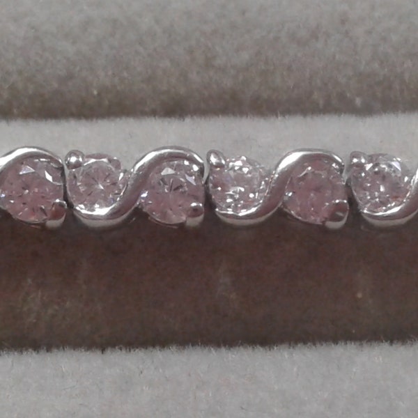 Cubic Zirconia and Silvertone Base Metal Tennis Bracelet, Safety Catch, Marked CN