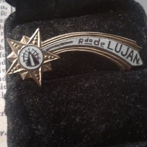 R do de Lujan Shooting Star Shaped Enamel and Metal Pilgrimage Badge with Small Image of Icon Our Lady of Lujan