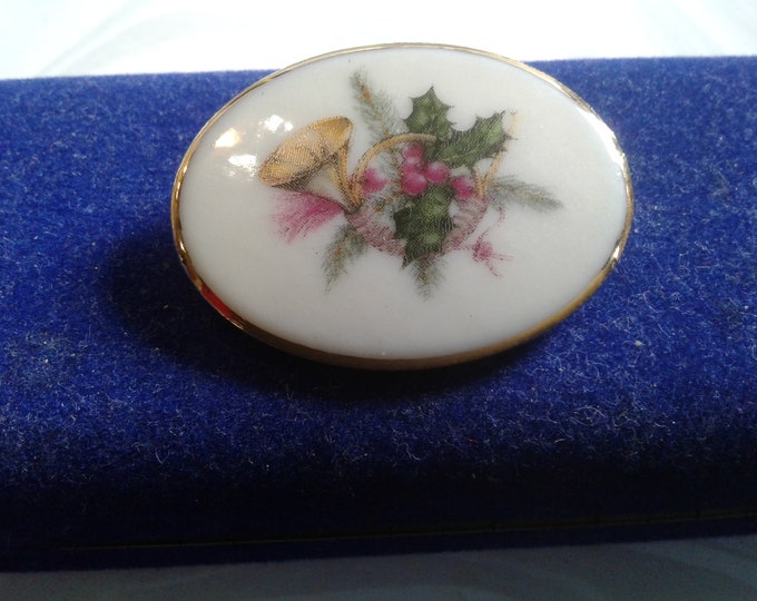 Glazed Ceramic Oval Brooch with Gilding and Fired Decal Image of Horn with Christmas Greenery