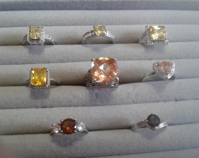 Selection of Canary, Champagne, and Brown Fancy Cubic Zirconia Silvertone Plated Solitaire Rings, Inc. RSC Covenant with Diamond Accents,