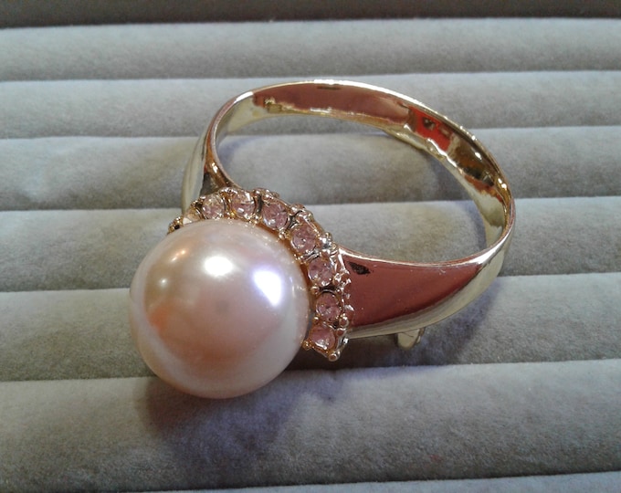 AJC "Pearl Ring" Brooch in Goldtone with Rhinestones and a Large Faux Pearl, Signed