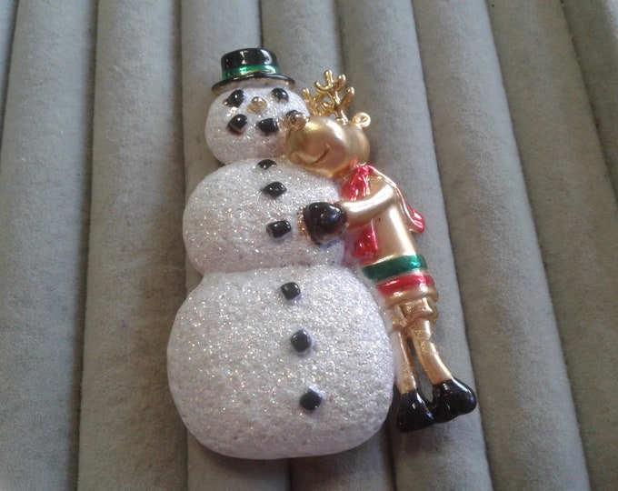 AJC Goldtone Reindeer Hugging a Snowman Pin, Signed