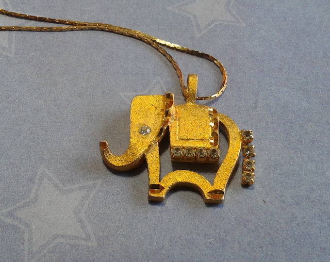 Glitzy Goldtone and Rhinestone Elephant Pendant on Longer Serpentine Chain