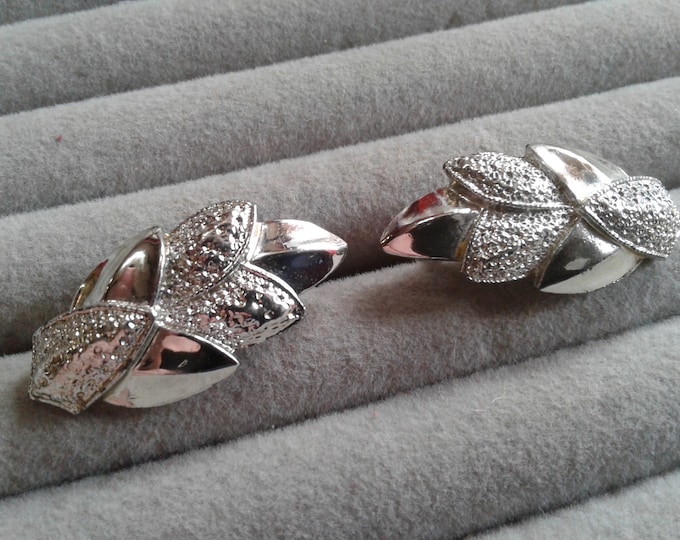 Coro Curved Stylized Leaf Silvertone Clip On Earrings
