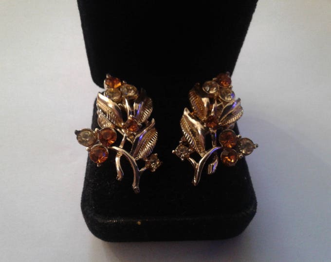 Gold tone leaf and Branch mid-century vintage clip on earrings with lemon and amber colored rhinestones