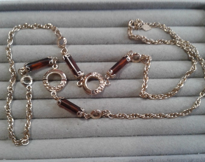 Sarah Coventry 1970's 28" Goldtone Chain Necklace with Root Beer Cylinders and Decorative Circles, Signed
