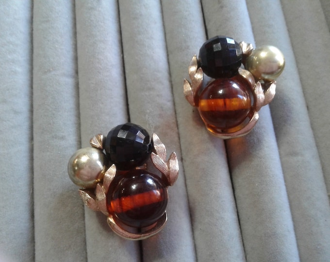 Slightly Oversized Black, Cognac, Goldtone Clusters in Goldtone Leaf Mounts