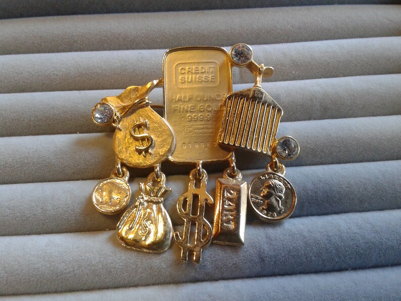 Signed and Faux Currency Rolls Royce Grill AJC Rich and Famous Matte and Shiny Goldtone Pin with Money Bag Rhinestones