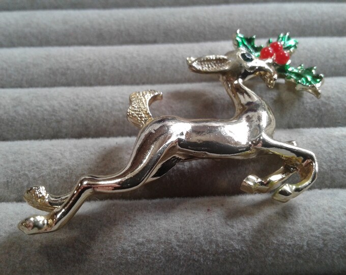 Midcentury Deer with Rhinestone Eye and Sprig of Holly in Its Mouth Brooch
