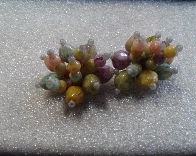 Exuberant Plastic Beaded Cluster Clip On Earrings in shades of Yellow, Orange, Green, and Purple