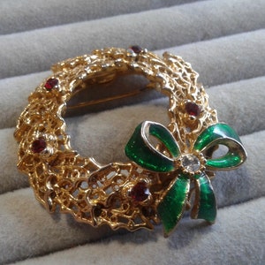 Goldtone Filigree Wreath Brooch with Green Enamel and Red Rhinestones