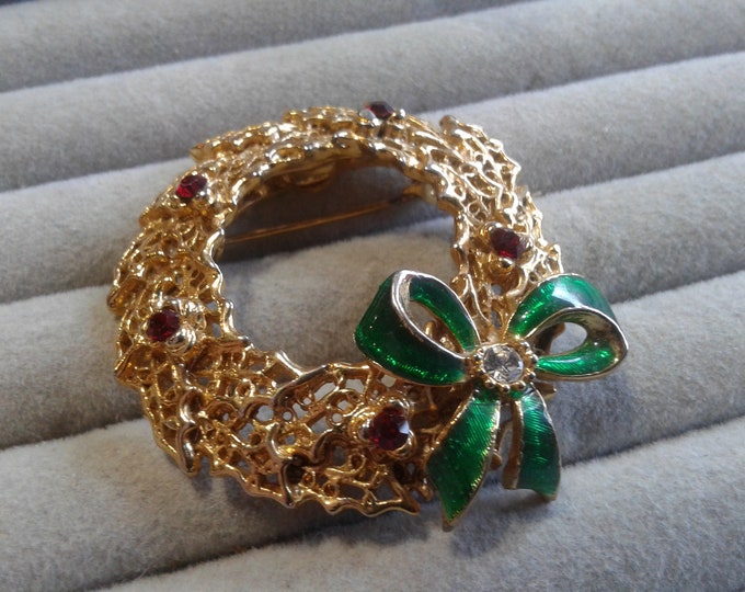 Goldtone Filigree Wreath Brooch with Green Enamel and Red Rhinestones