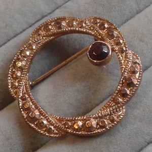 Small Golden Marcasite and Goldtone Circle Brooch with Black Accent