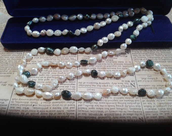 Long Knotted Strand of Multicolored Semi-Baroque Freshwater Pearls, Mostly Cream and Dark Gray