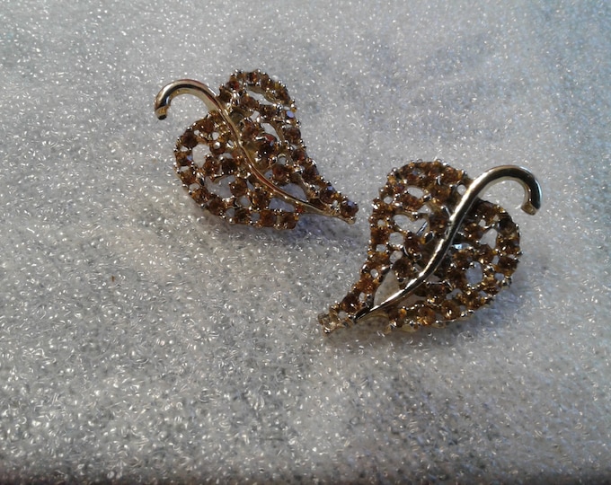 Goldtone and Champagne Rhinestone Oversized Leaf Clip On Earrings