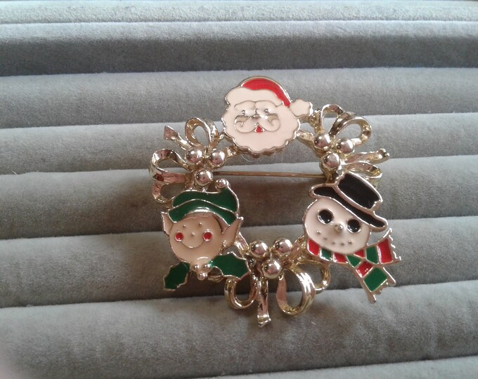 Goldtone and Enamel Circle Wreath Brooch with Cloisonne Santa, Elf, and Snowman